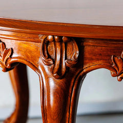 Classic Teakwood Round Dining Table with Carved Floral Design